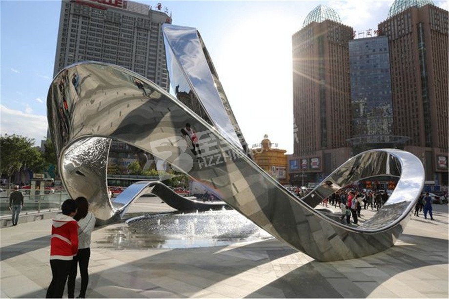 城市广场标志性地标镜面抽象飘带不锈钢雕塑定制
